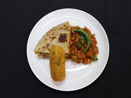 Amritsari chole with green peas Paratha & vermicelli roll + water