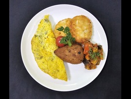 Mushroom omlette with maccain potato & chicken cutlet + water